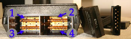 HP-41 Calculator back view, with some I/O modules, and I/O ports labeled from 1 to 4